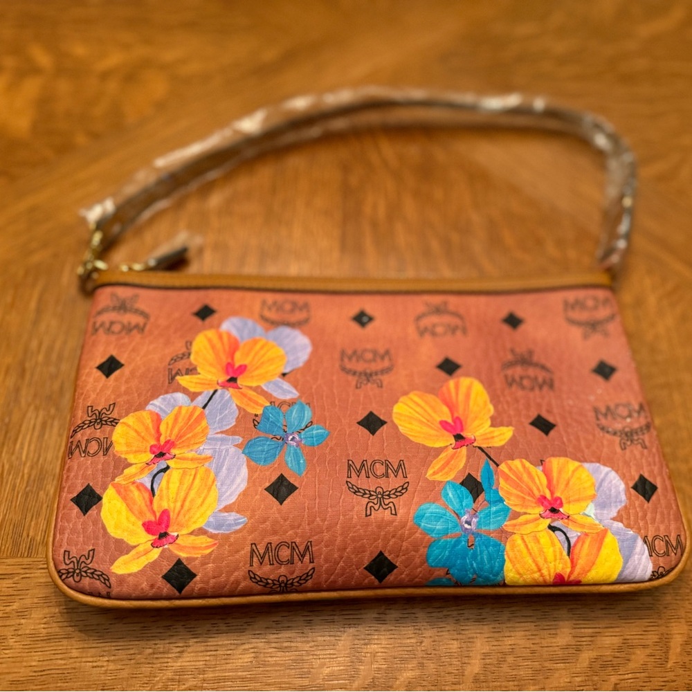 MCM Brown and Yellow Clutch with Floral Accents